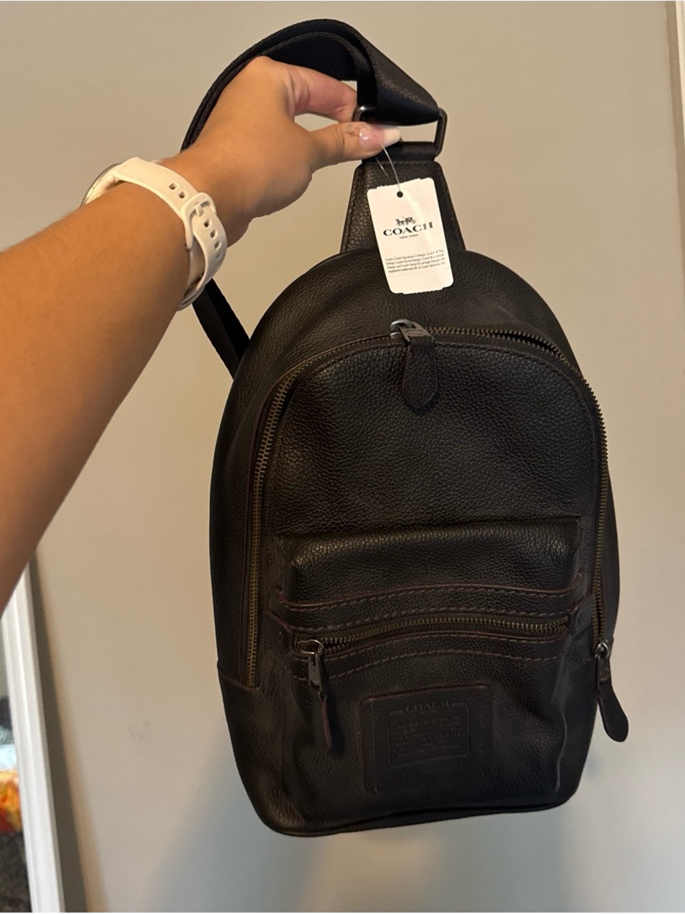 Coach Men’s Black Leather Sling Backpack